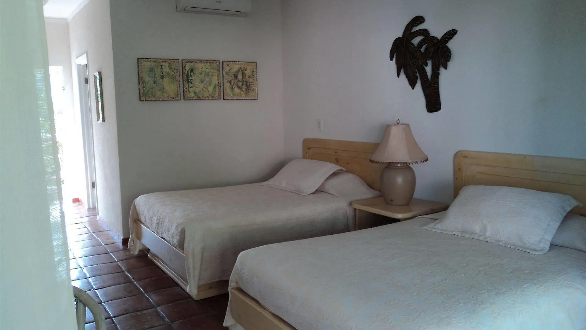 גרייס ביי Caribbean Paradise Inn איי טרקס וקייקוס
